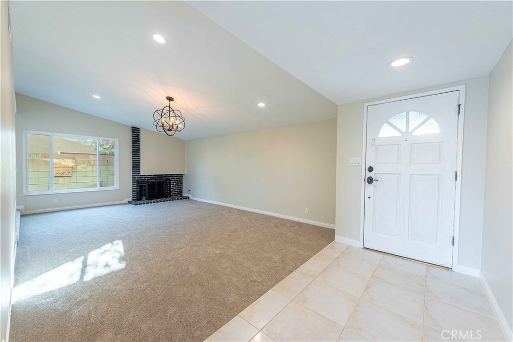 2232 Hawk Street Simi Valley, CA 93065 - Photo 5 of 39 a view of empty room with a fireplace