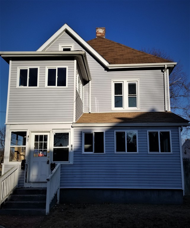 19 Merrick Avenue Springfield, MA 01109 - Photo 1 of 20 a front view of a house with a yard