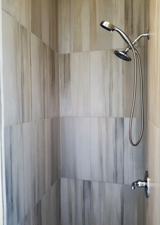 19 Merrick Avenue Springfield, MA 01109 - Photo 5 of 20 a bathroom with a shower curtain