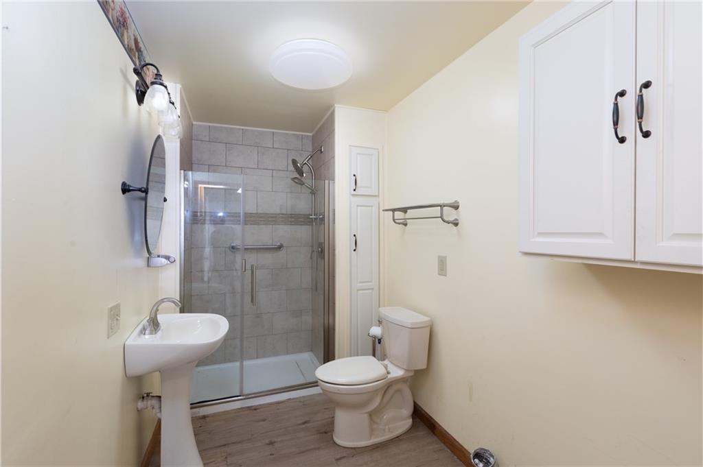 37 Redstone Street Republic, PA 15475 - Photo 12 of 19 a bathroom with a sink toilet and shower