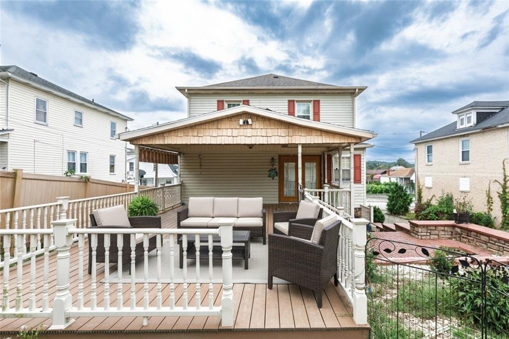 37 Redstone Street Republic, PA 15475 - Photo 15 of 19 a view of a house with patio and wooden floor