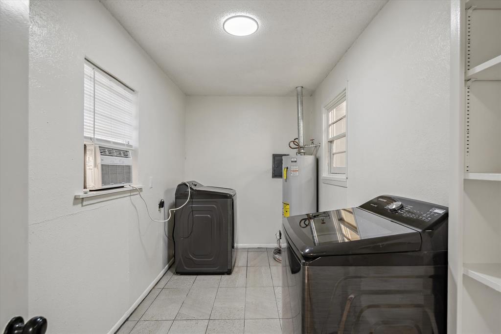 1460 Forrest Drive Canton, TX 75103 - Photo 27 of 36 a room with storage and utility