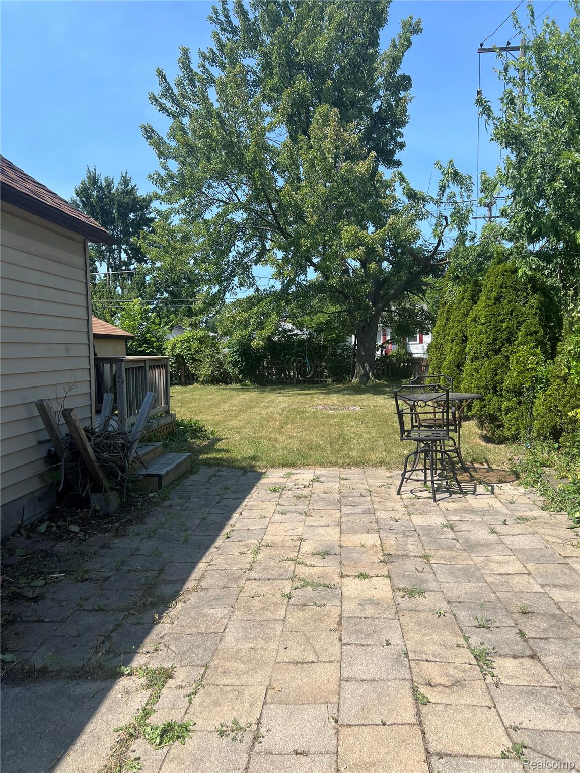 15676 Frazho Road Roseville, MI 48066 - Photo 18 of 20 Expansive outdoor patio area featuring paver stone flooring