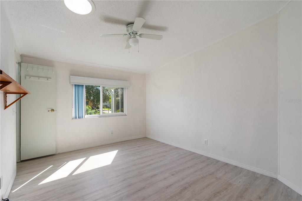 701 Helmsman Lane Edgewater, FL 32141 - Photo 30 of 73 a view of an empty room with a window