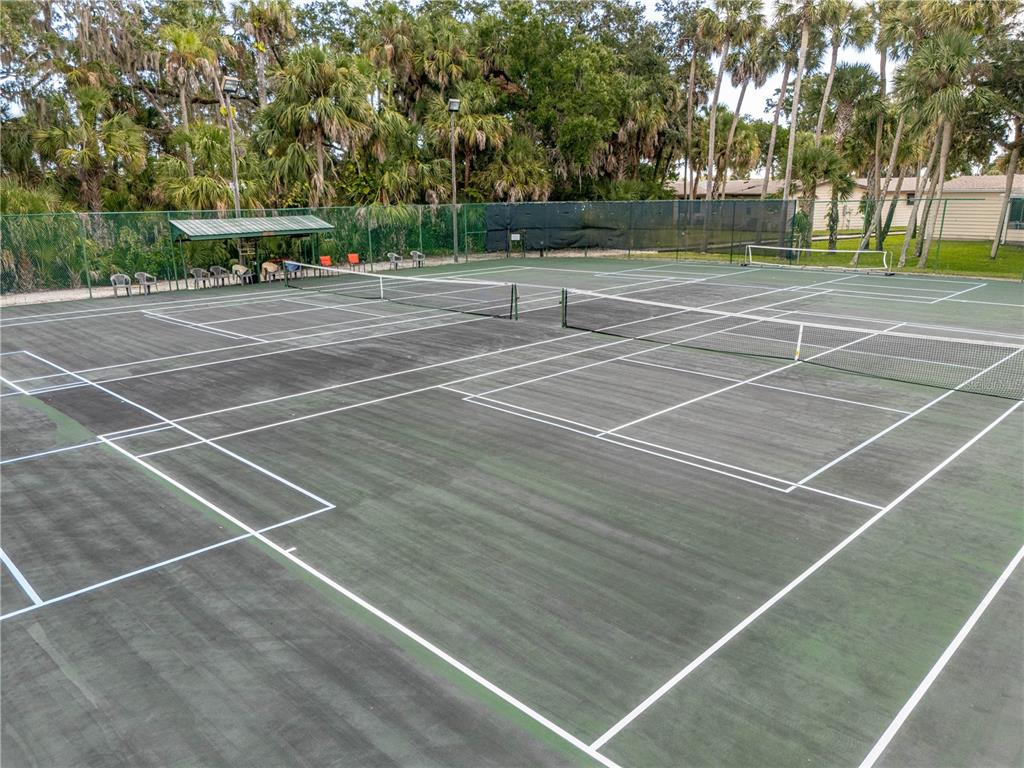 701 Helmsman Lane Edgewater, FL 32141 - Photo 36 of 73 a view of a tennis court