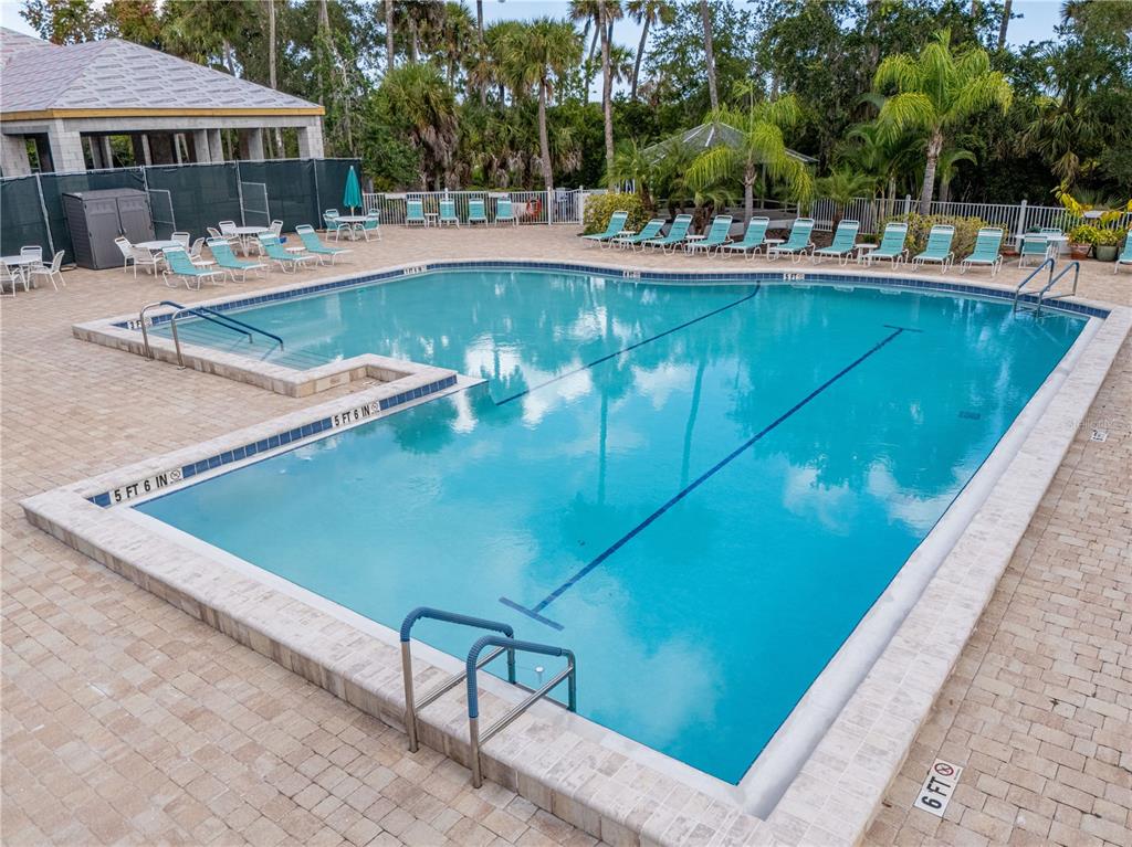 701 Helmsman Lane Edgewater, FL 32141 - Photo 40 of 73 a view of a swimming pool with a patio