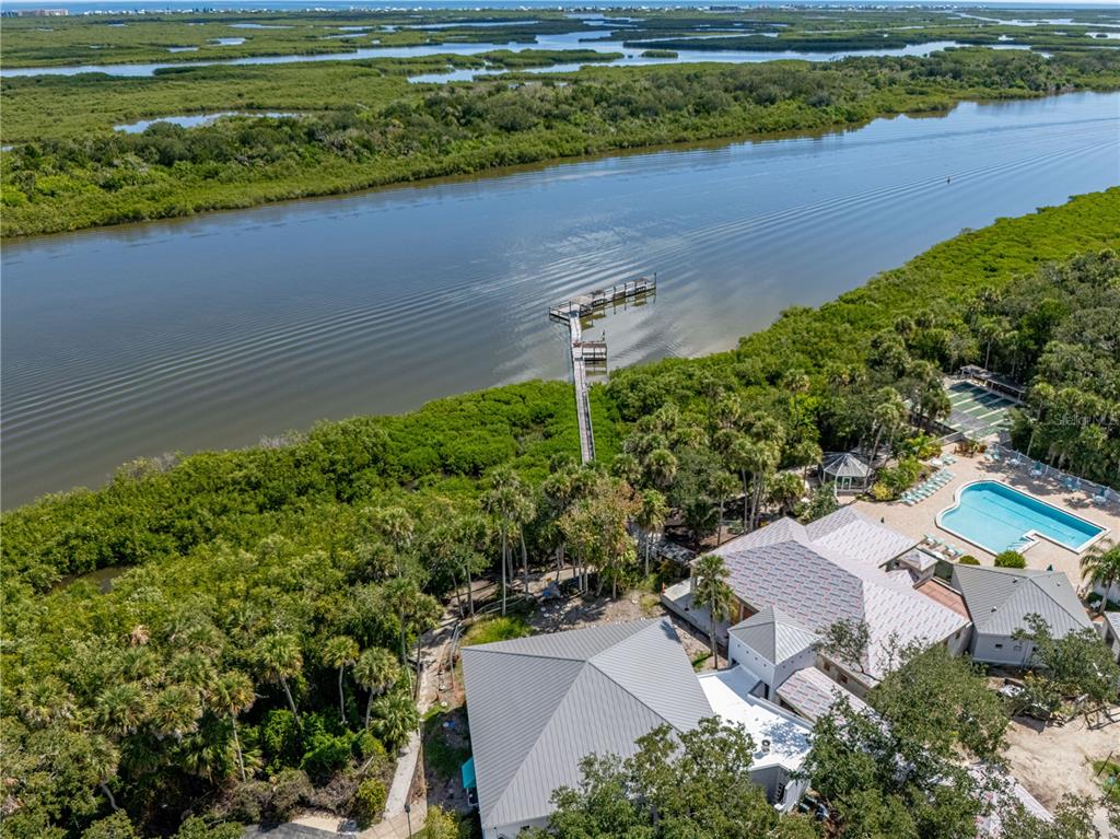 701 Helmsman Lane Edgewater, FL 32141 - Photo 57 of 73 an aerial view of a house with a yard and lake view