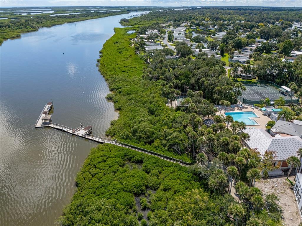 701 Helmsman Lane Edgewater, FL 32141 - Photo 60 of 73 an aerial view of a houses with a lake view