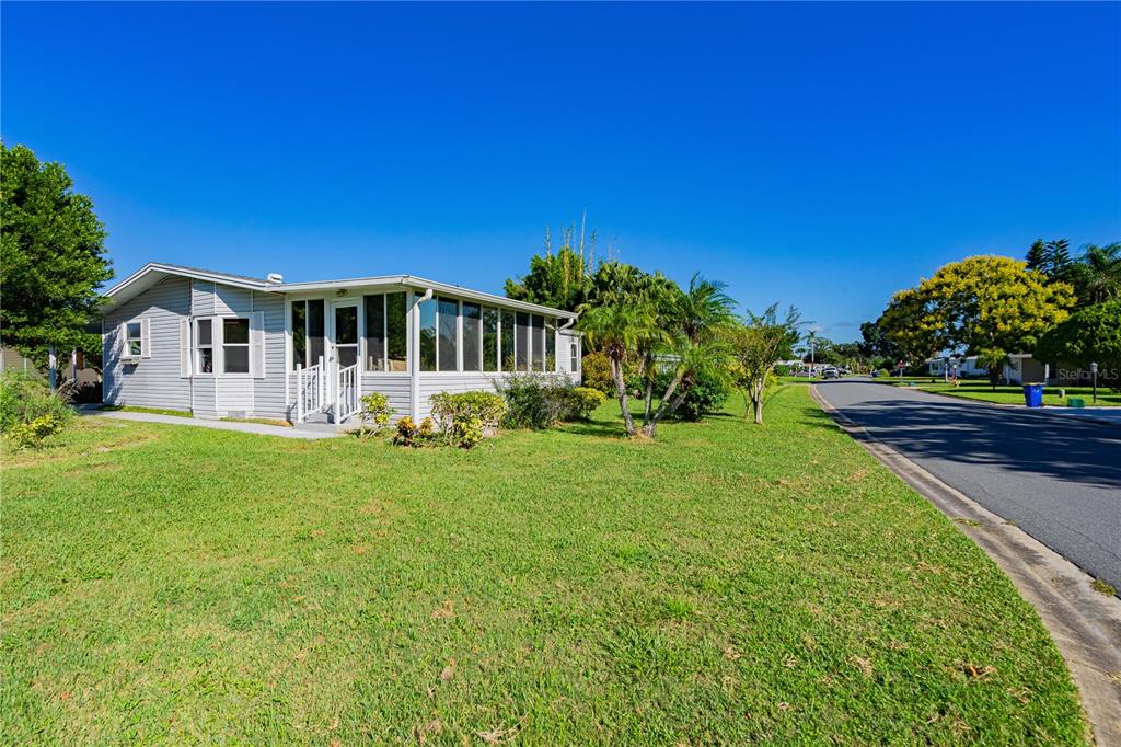 701 Helmsman Lane Edgewater, FL 32141 - Photo 64 of 73 a view of a house with a big yard