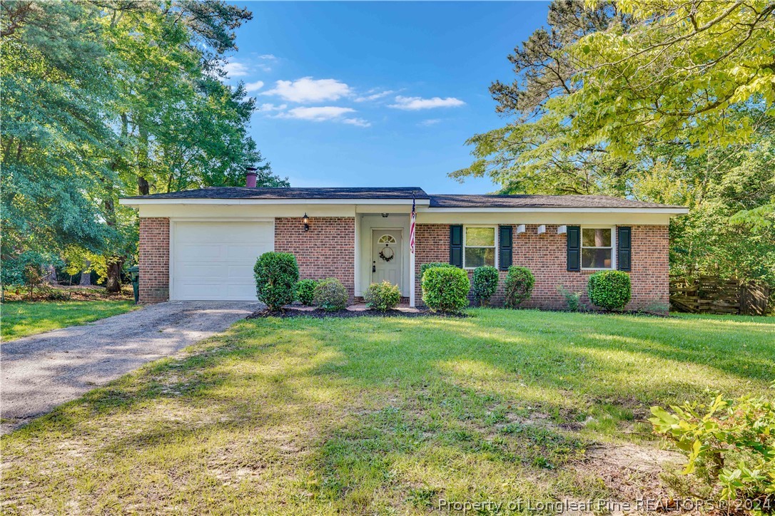 2540 Graham Road Fayetteville, NC 28304 - Photo 1 of 22 front view of a house with a yard