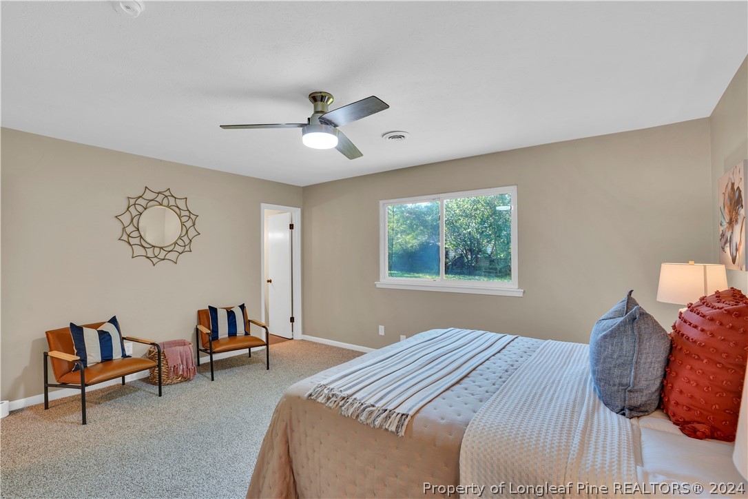 2540 Graham Road Fayetteville, NC 28304 - Photo 14 of 22 a bedroom with furniture and a large window