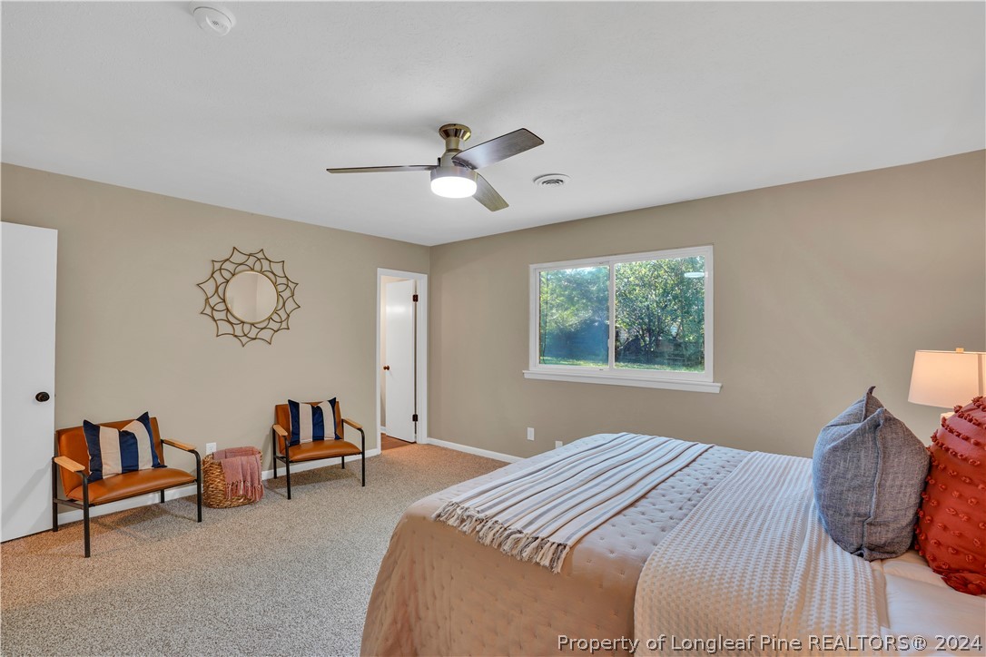 2540 Graham Road Fayetteville, NC 28304 - Photo 15 of 22 a bedroom with furniture and a large window