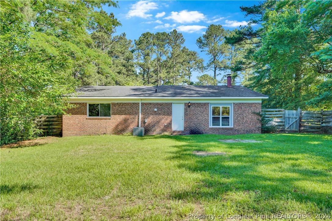 2540 Graham Road Fayetteville, NC 28304 - Photo 22 of 22 a view of a house with a backyard