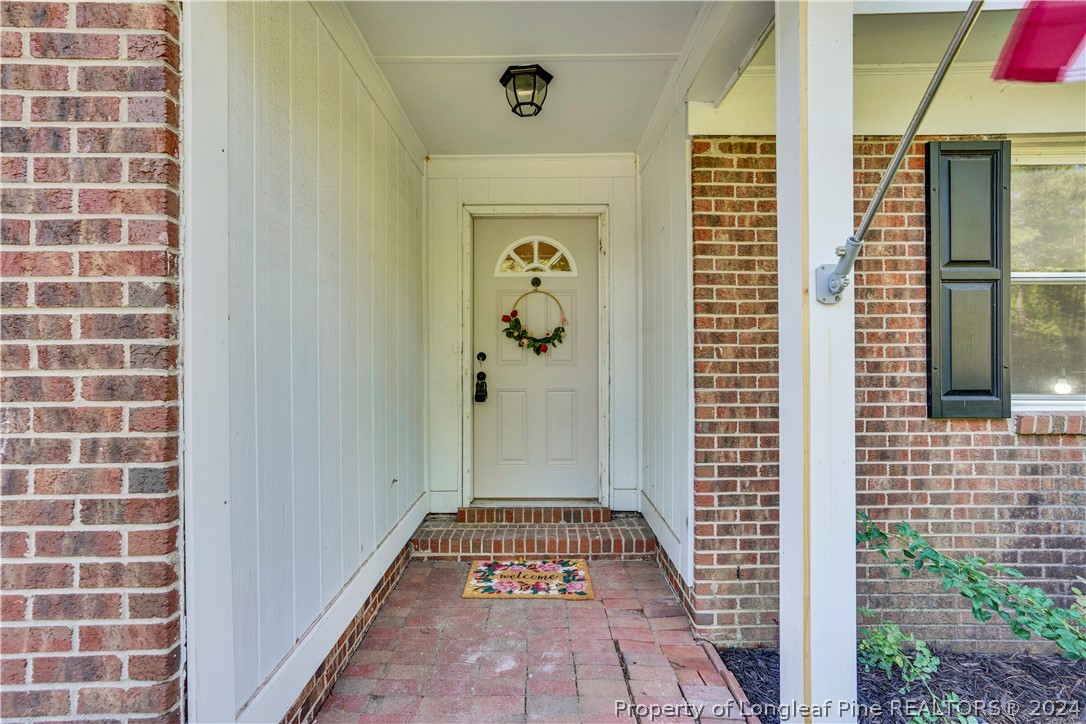 2540 Graham Road Fayetteville, NC 28304 - Photo 3 of 22 a view of a hallway with a door
