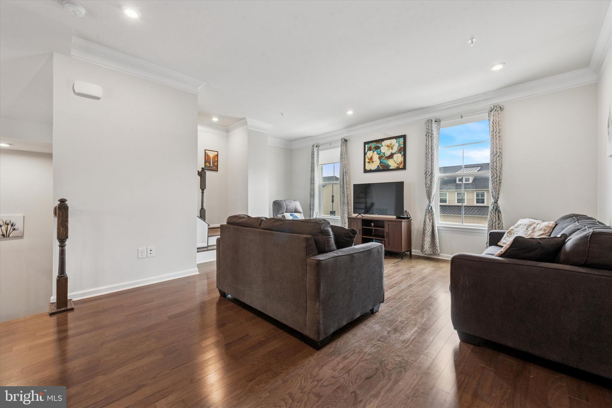 515 Quarry Point Road Malvern, PA 19355 - Photo 11 of 25 a living room with furniture window and a fireplace