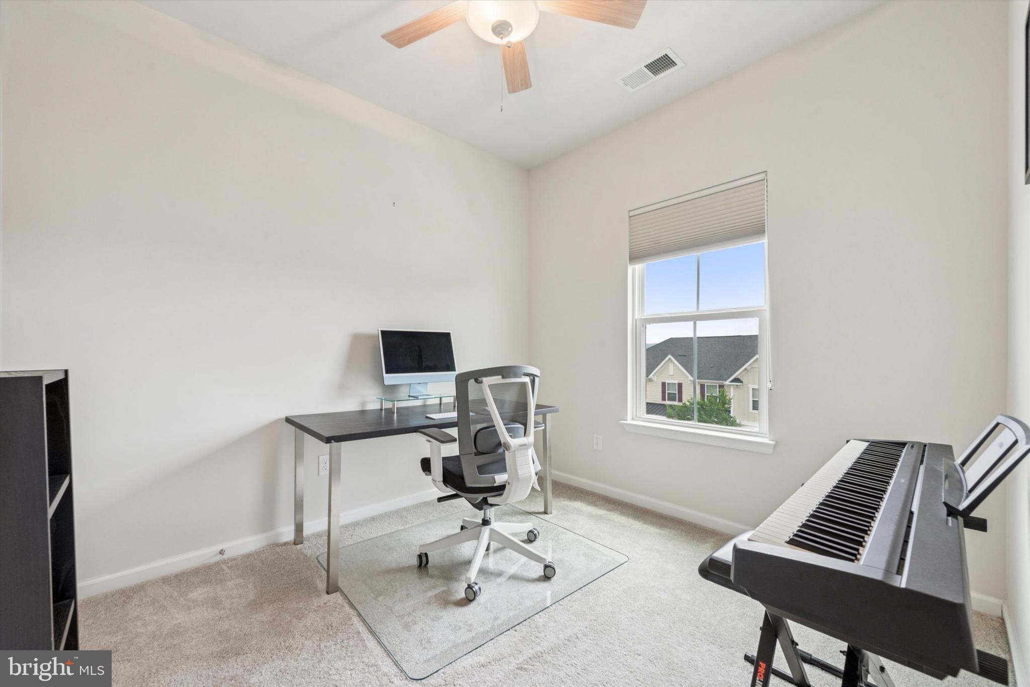 515 Quarry Point Road Malvern, PA 19355 - Photo 18 of 25 a view of workspace with wooden floor windows