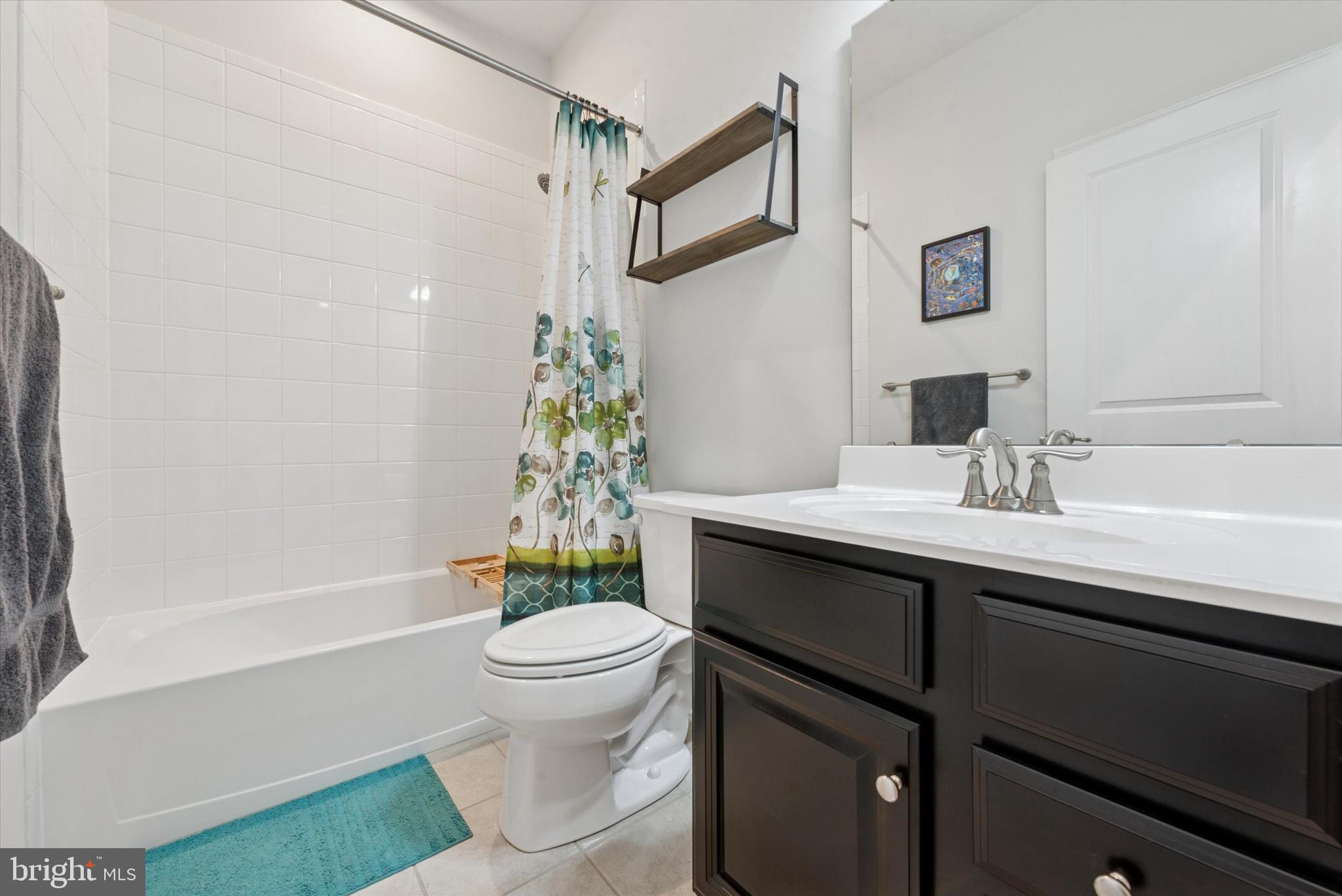 515 Quarry Point Road Malvern, PA 19355 - Photo 20 of 25 a bathroom with a sink toilet and shower