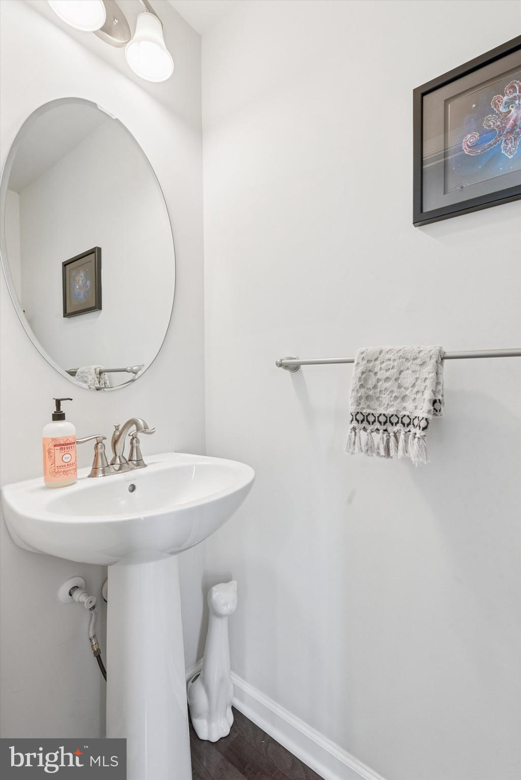 515 Quarry Point Road Malvern, PA 19355 - Photo 6 of 25 a bathroom with a sink and mirror