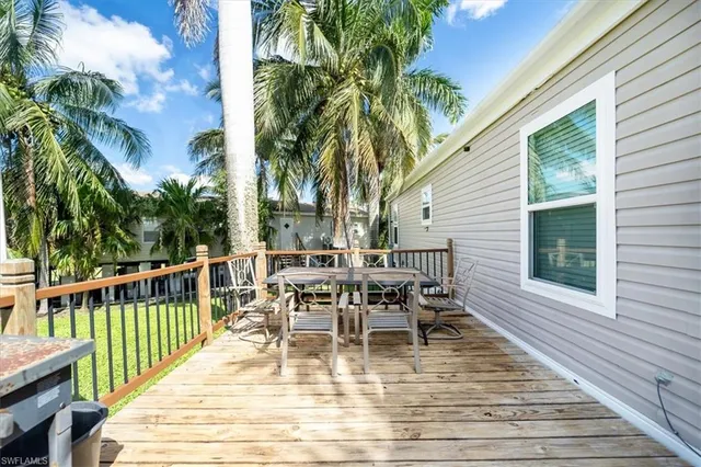 a living room with furniture fireplace and flat screen tv