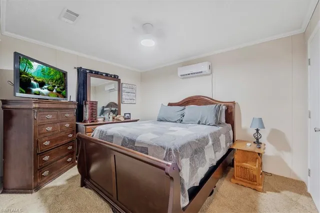 a kitchen with a sink appliances and cabinets