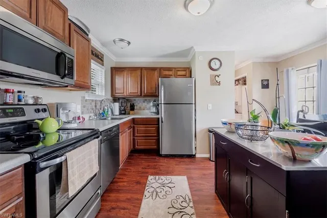 a view of living room filled with furniture and window