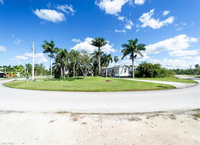 a view of a pathway with a house