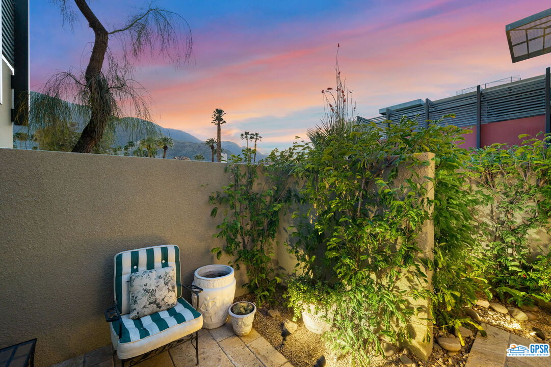 665 East Arenas Road Palm Springs, CA 92262 - Photo 18 of 40 a view of a chairs in front of house
