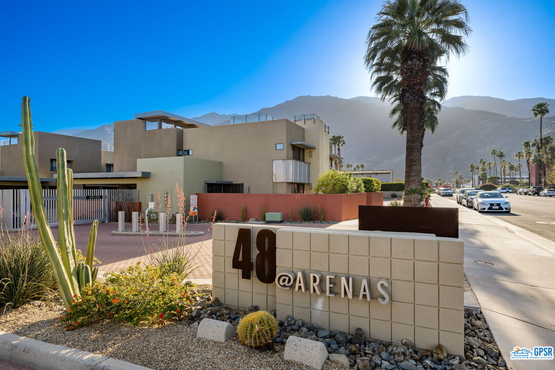 665 East Arenas Road Palm Springs, CA 92262 - Photo 2 of 40 a view of a terrace with couches and swimming pool