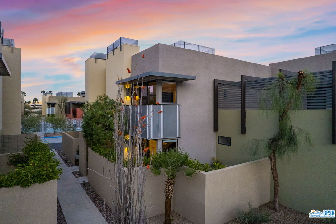 665 East Arenas Road Palm Springs, CA 92262 - Photo 35 of 40 a house view with a garden space
