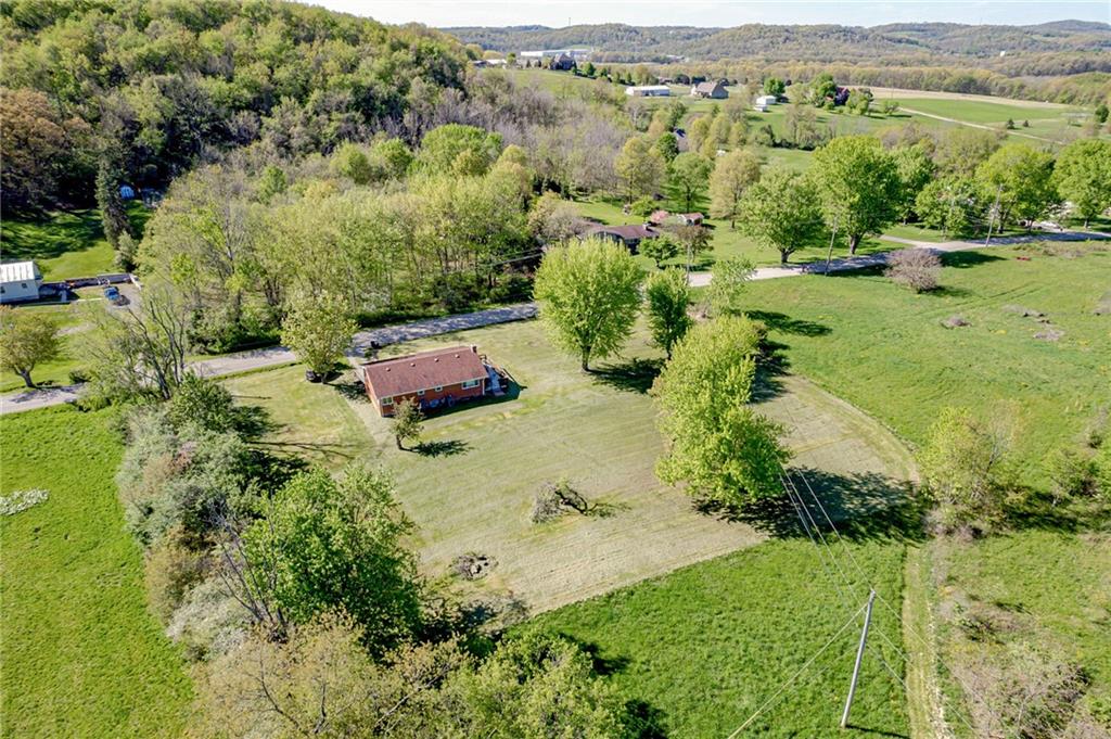 236 Gressly Road Ruffs Dale, PA 15679 - Photo 3 of 22 an aerial view of residential houses with outdoor space and trees