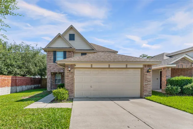 front view of house with a yard