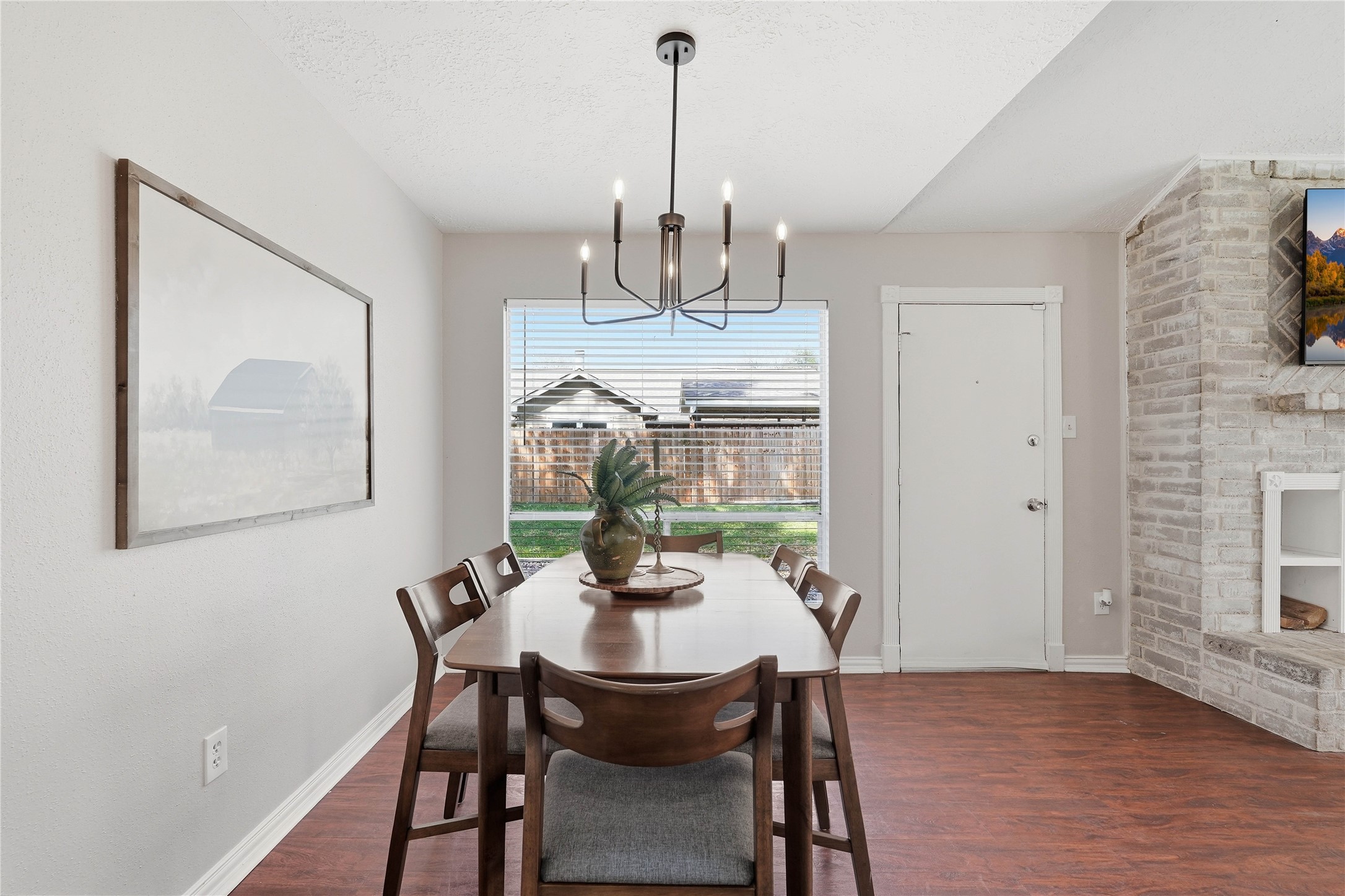 4506 Pineville Lane Spring, TX 77388 - Photo 3 of 33 a view of a dining room with furniture window and wooden floor