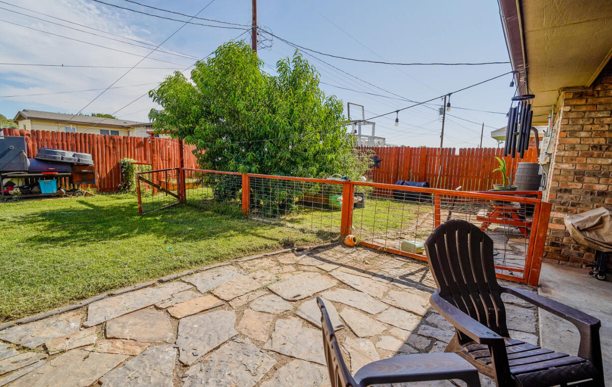 603 15th Street Shallowater, TX 79363 - Photo 18 of 18 a view of a backyard with sitting area