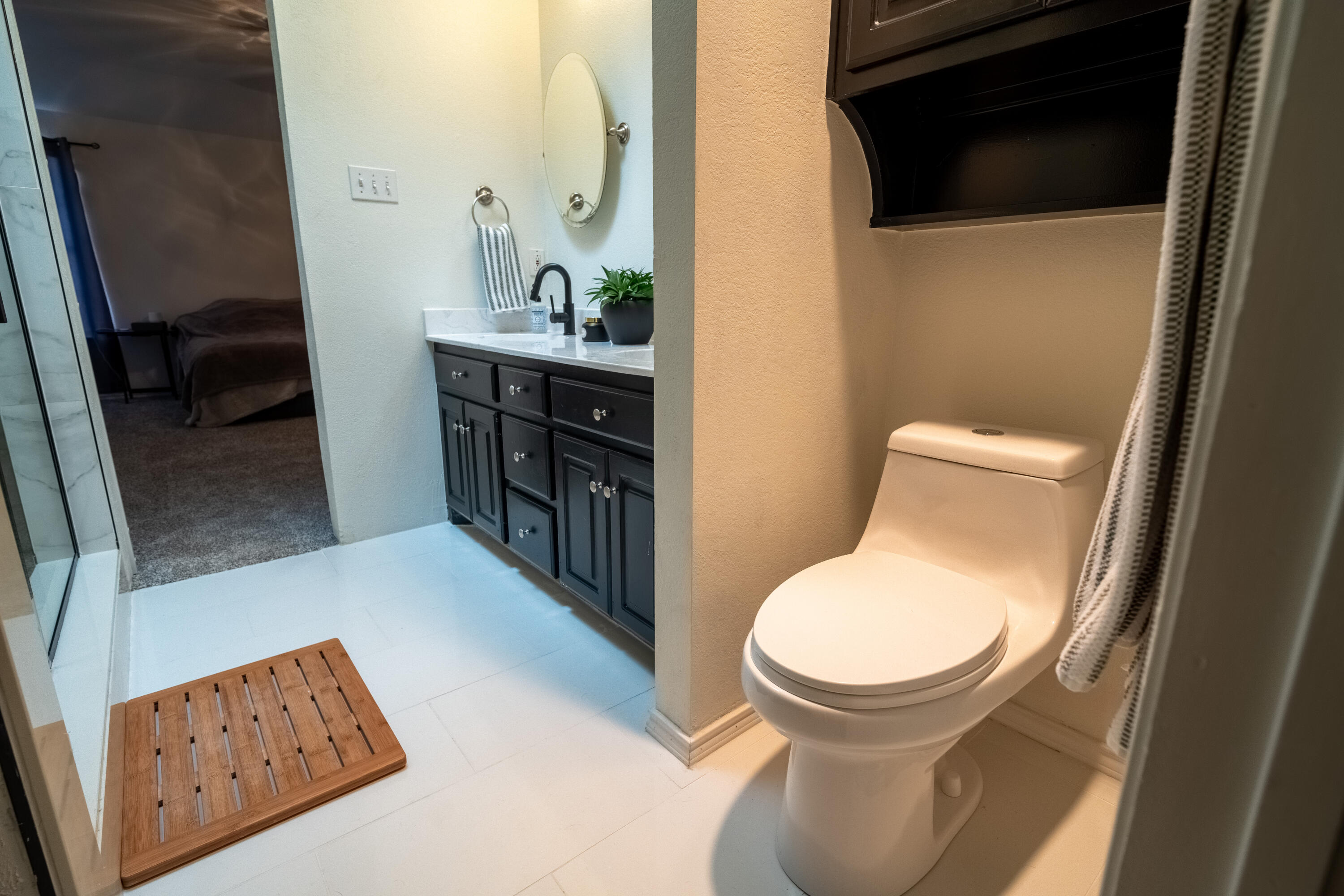 603 15th Street Shallowater, TX 79363 - Photo 9 of 18 a bathroom with a toilet and a sink
