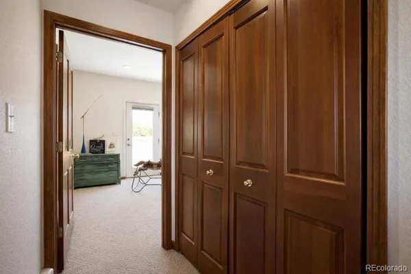 a view of a bathroom from a hallway