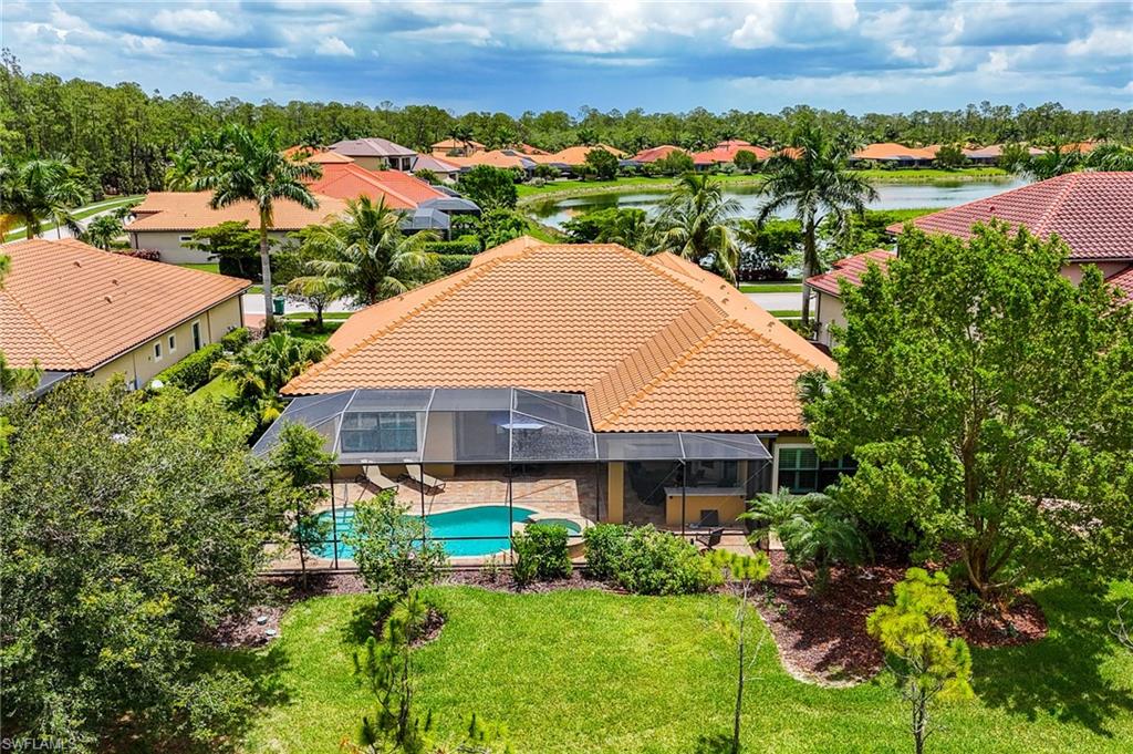 1387 Mockingbird Drive Naples, FL 34120 - Photo 40 of 46 an aerial view of a house