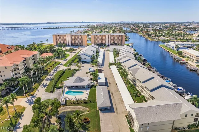 a front view of a building with garden