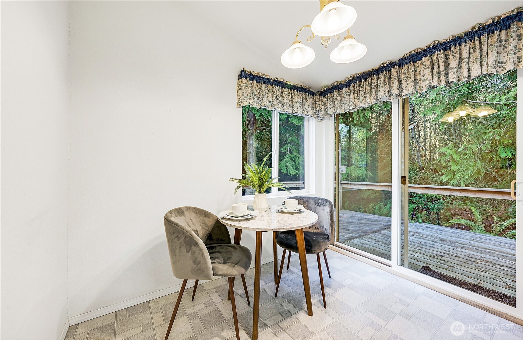 2399 Highland Loop Port Townsend, WA 98368 - Photo 11 of 31 a view of a dining room with furniture window and outside view