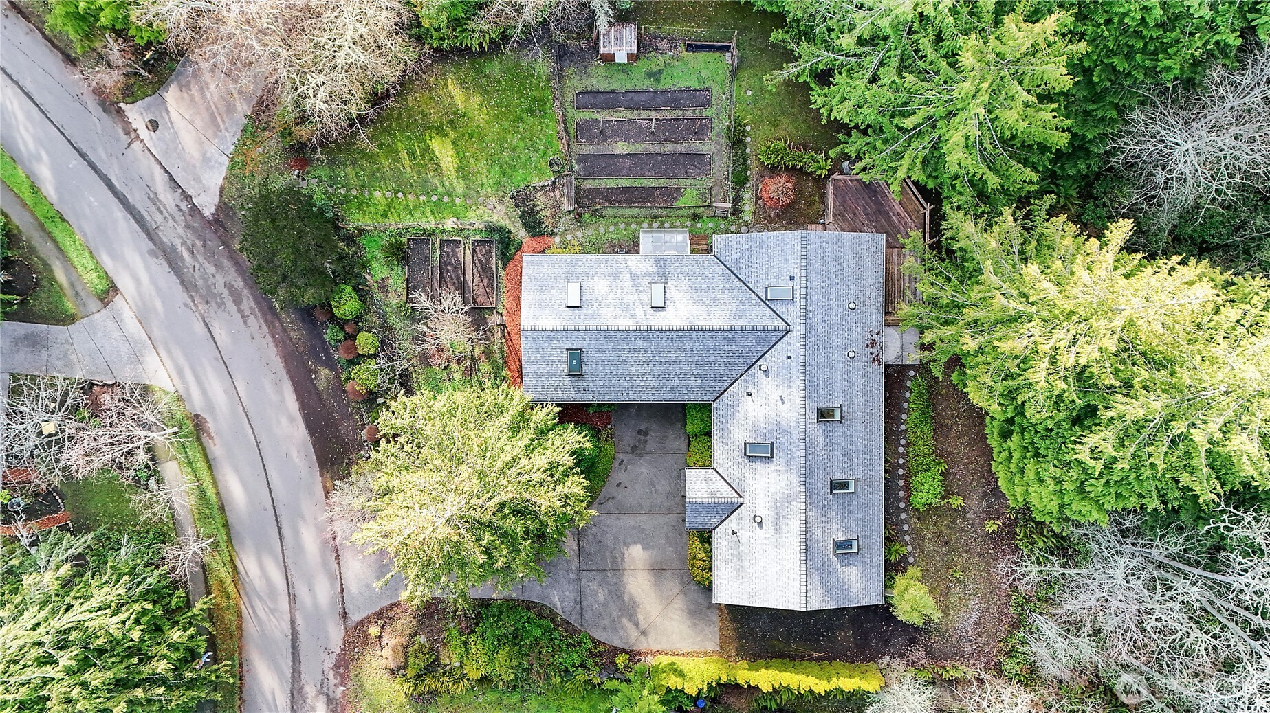 2399 Highland Loop Port Townsend, WA 98368 - Photo 2 of 31 an aerial view of a house with yard and swimming pool
