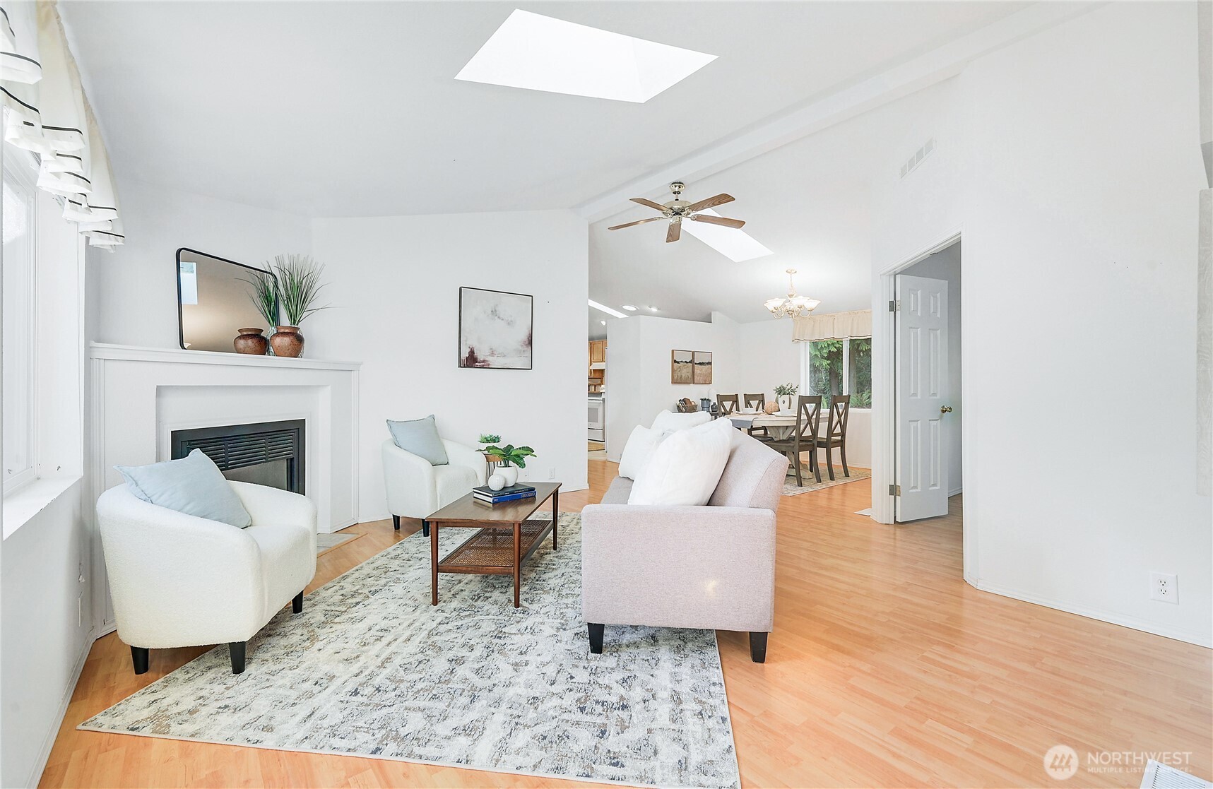 2399 Highland Loop Port Townsend, WA 98368 - Photo 3 of 31 a living room with furniture and a fireplace