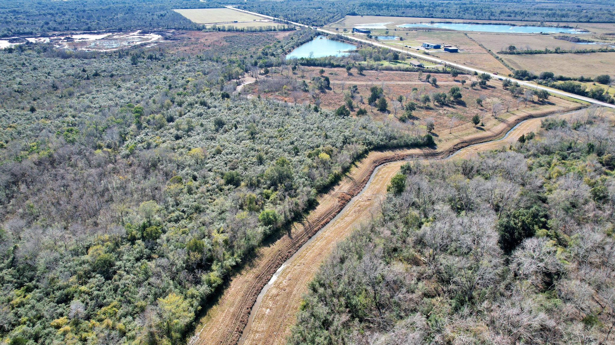 10 Fm 2403 Alvin, TX 77511 - Photo 27 of 48 a view of a yard with a forest