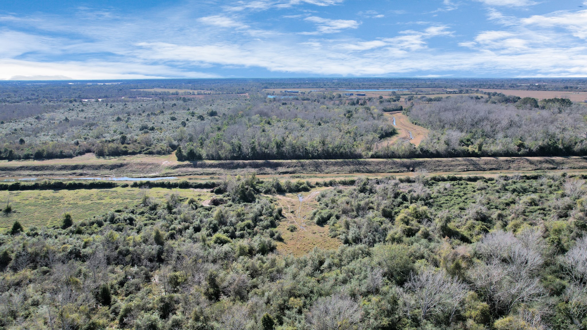 10 Fm 2403 Alvin, TX 77511 - Photo 36 of 48 a view of a field with an ocean beach