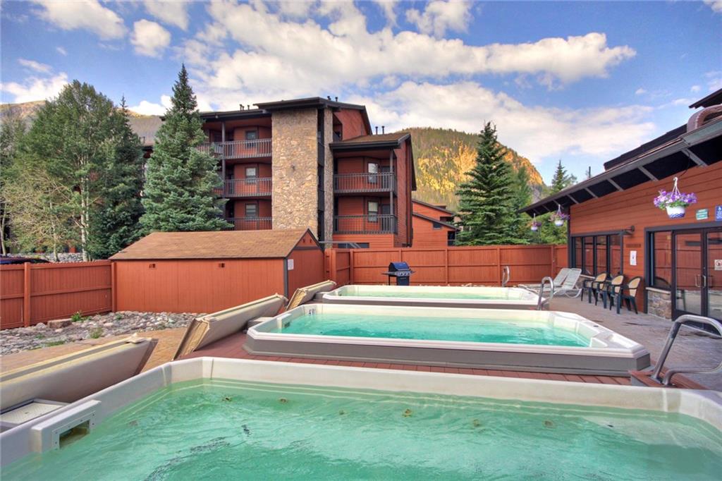 570 Bills Ranch Road, Unit 235 Frisco, CO 80443 - Photo 22 of 25 a backyard of a house with outdoor seating
