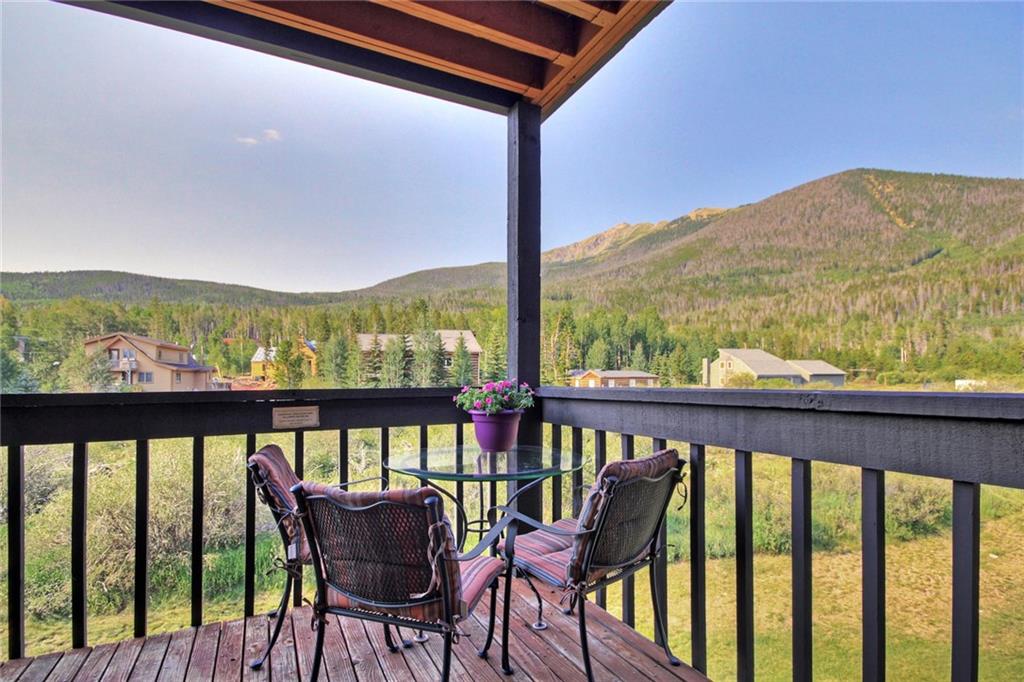 570 Bills Ranch Road, Unit 235 Frisco, CO 80443 - Photo 4 of 25 a view of a chairs and table in the balcony