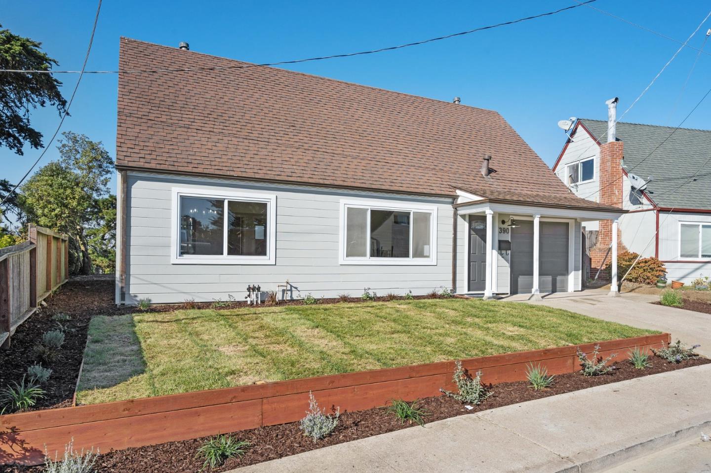 a view of house with yard