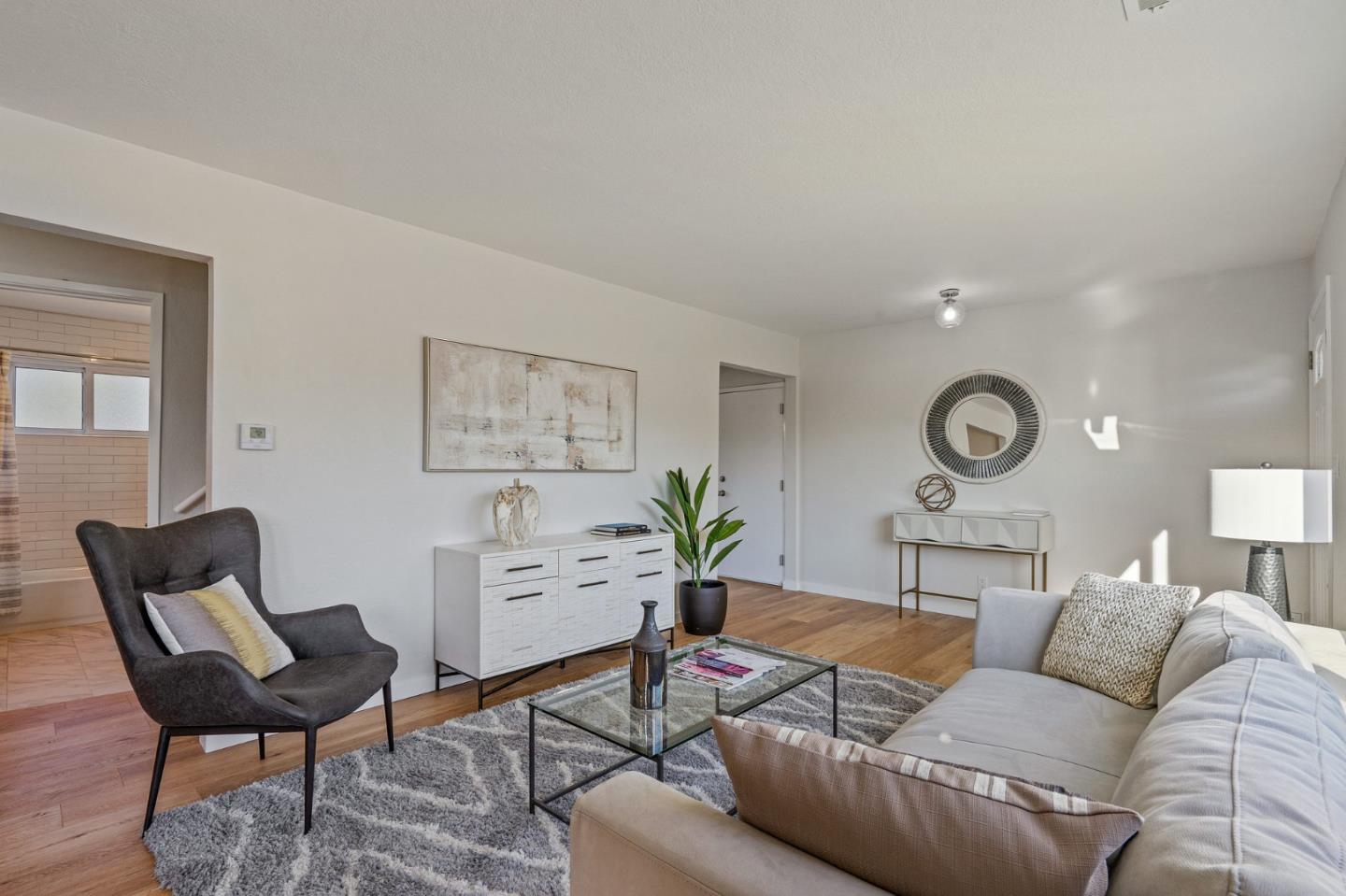 390 Heathcliff Drive Pacifica, CA 94044 - Photo 12 of 43 a living room with furniture