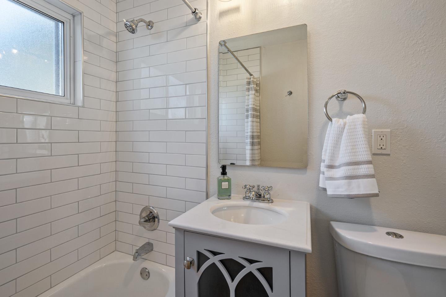 390 Heathcliff Drive Pacifica, CA 94044 - Photo 26 of 43 a bathroom with a sink a toilet and shower