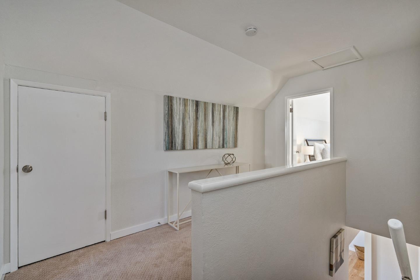 390 Heathcliff Drive Pacifica, CA 94044 - Photo 28 of 43 a bathroom with a sink and a mirror
