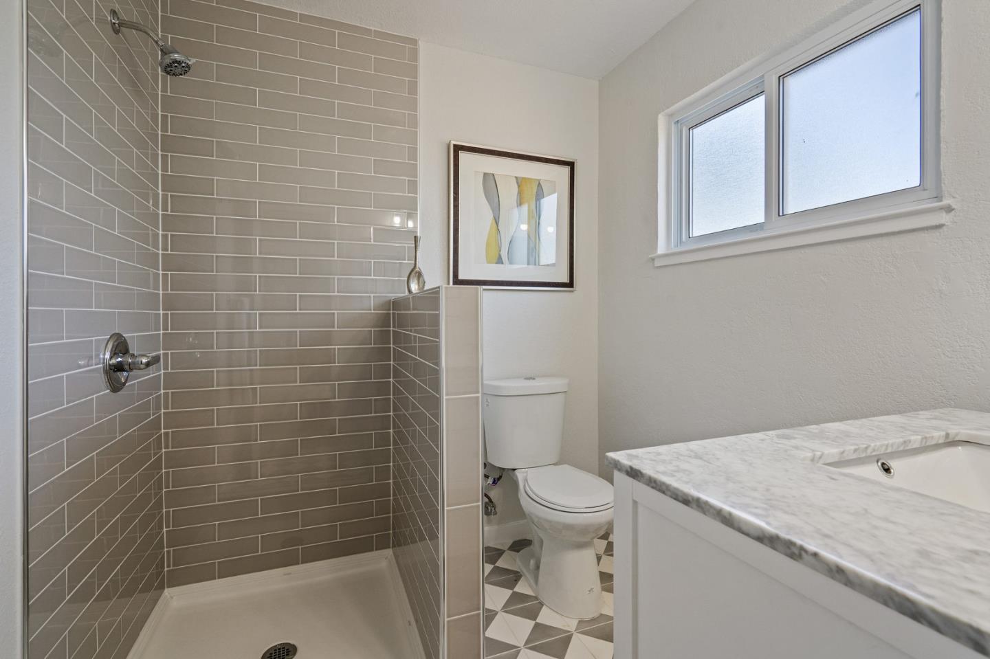 390 Heathcliff Drive Pacifica, CA 94044 - Photo 35 of 43 a bathroom with a sink a toilet and shower