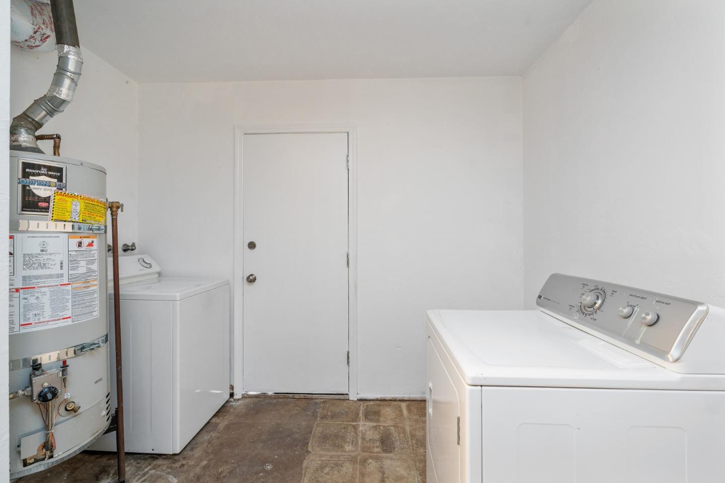 390 Heathcliff Drive Pacifica, CA 94044 - Photo 38 of 43 a utility room with dryer and washer